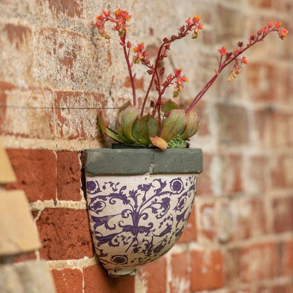 Half round aged ceramic wall planter