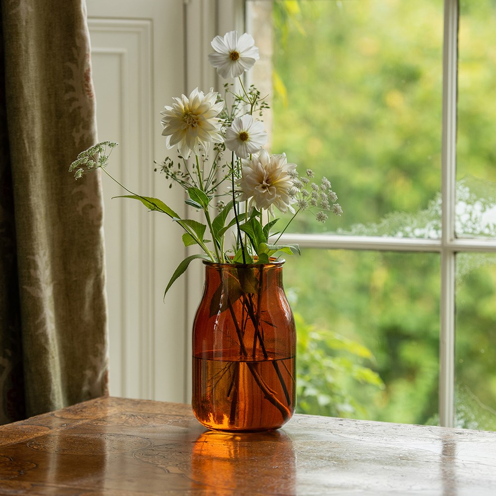 Amber glass bottle vase