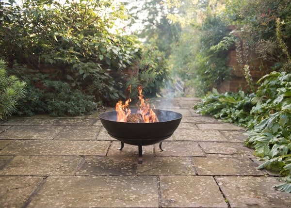 Iron disc fire pit with stainless steel cooking grill