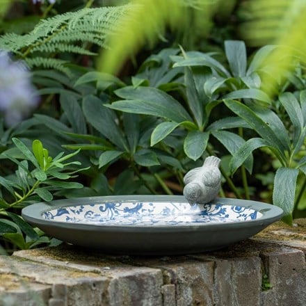 Aged ceramic bird bath