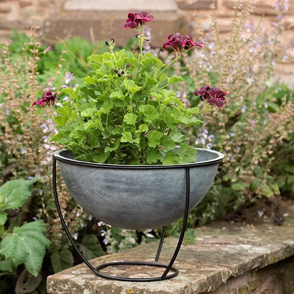 Aged zinc plant bowl and stand