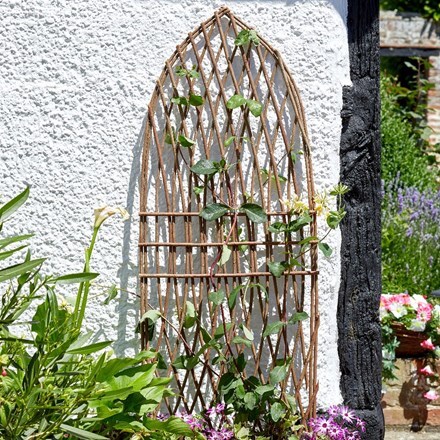 Gothic arch style rustic willow trellis
