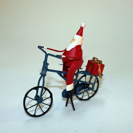 Santa on bike with gift