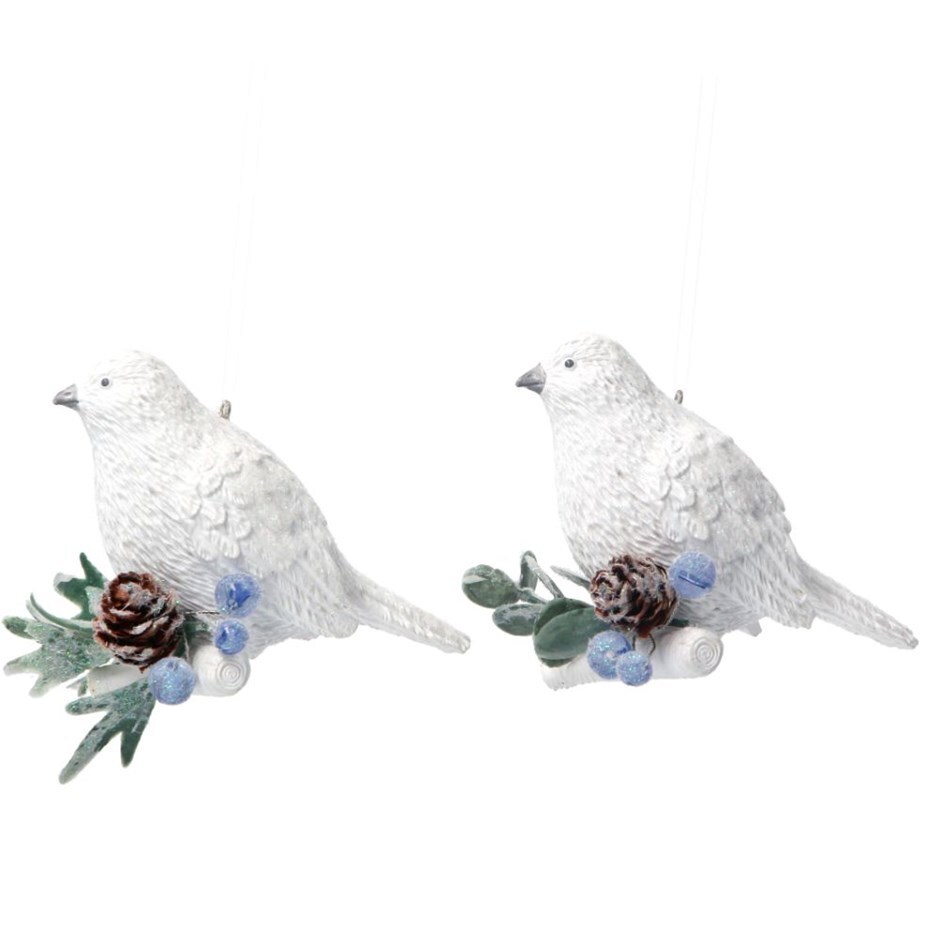 White resin bird with eucalyptus and blueberries