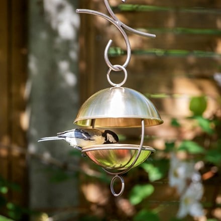 Brushed brass satellite bird seed feeder