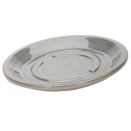 Glazed antique grey saucer