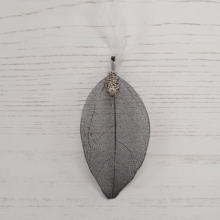 Silver leaf with seed beads