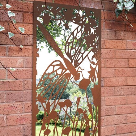 Portrait rusted metal garden mirror