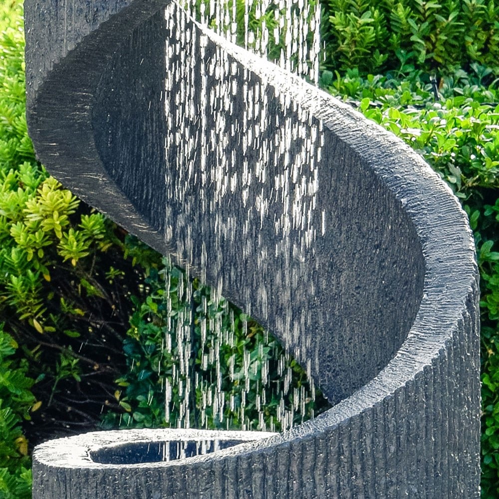 Outdoor spiral water feature granite