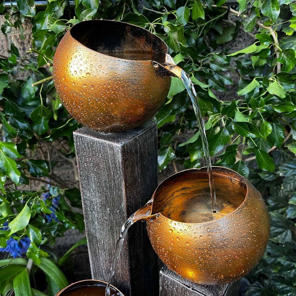 Three copper bowls water feature