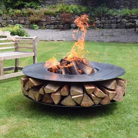Fire pit with log storage and cooking grill