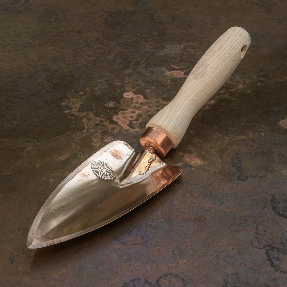 Copper pointed digging trowel
