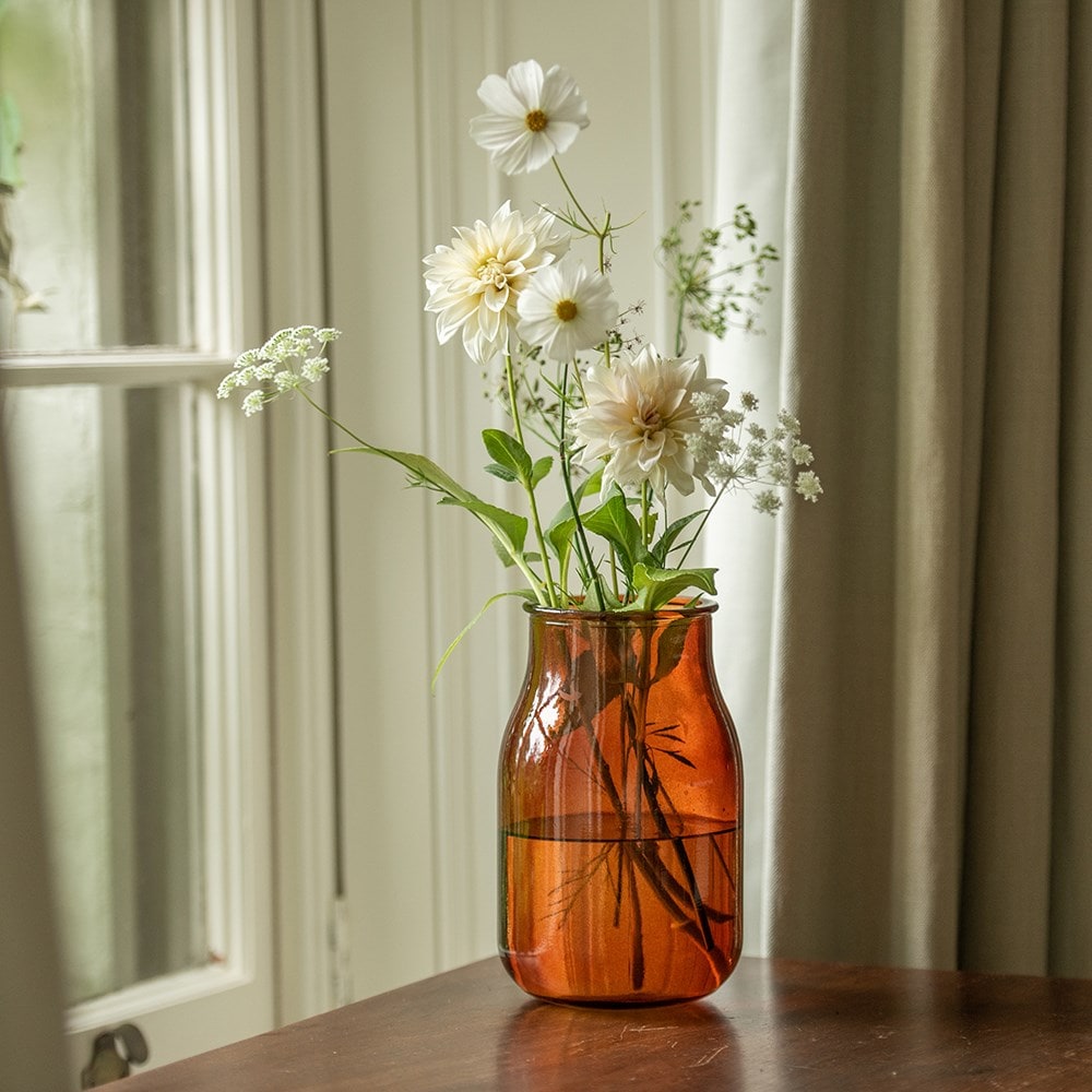 Amber glass bottle vase
