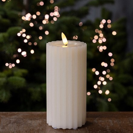 Ribbed cream LED wick candle