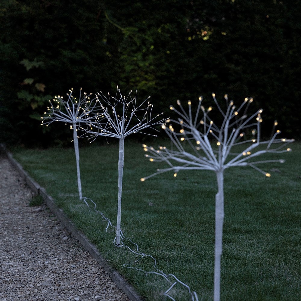 Three Solar fireburst stake lights