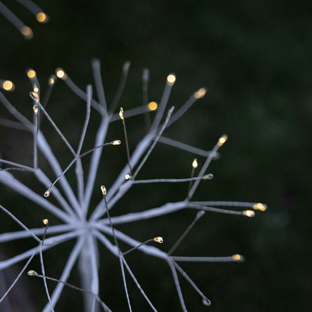 Three Solar fireburst stake lights