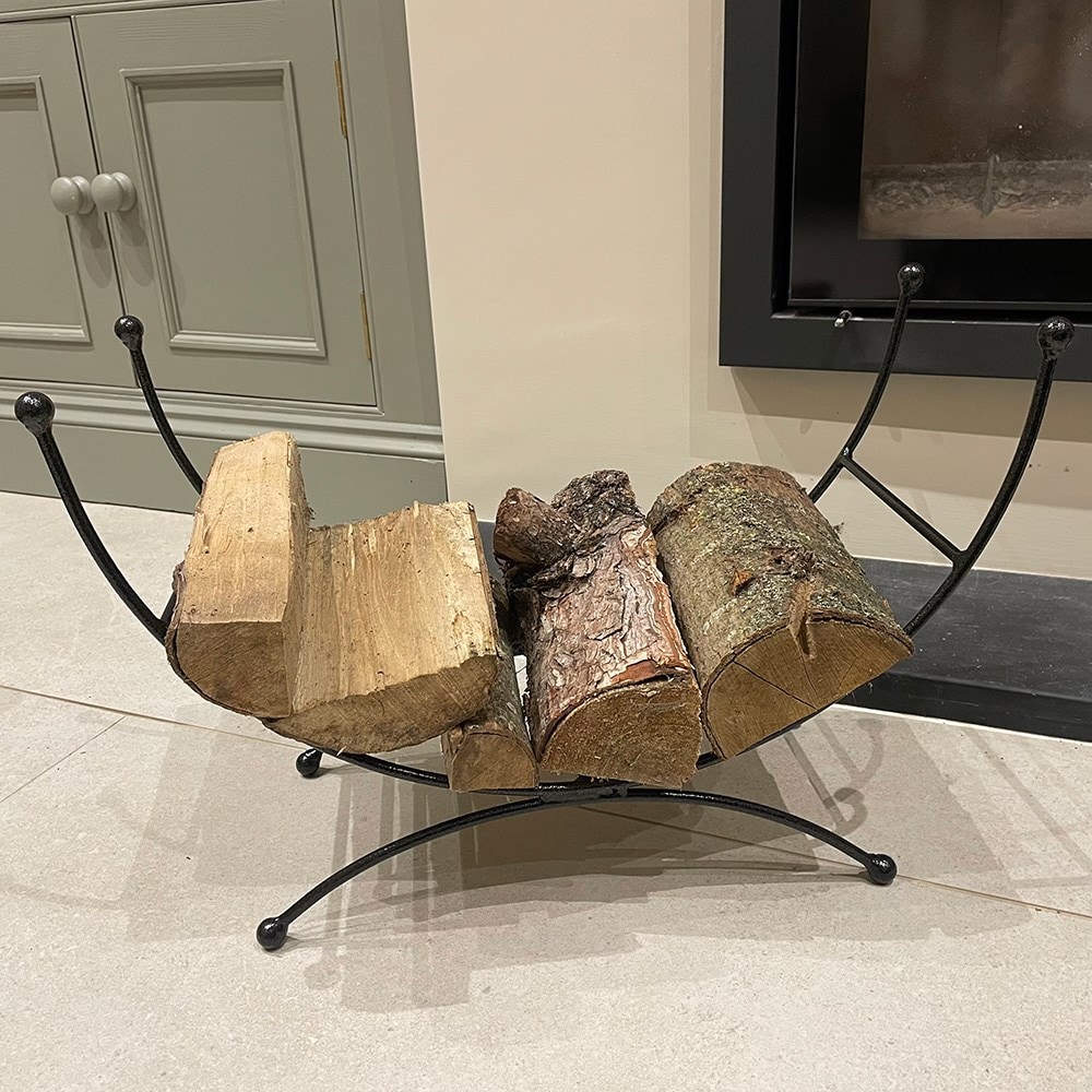 Steel curve log holder