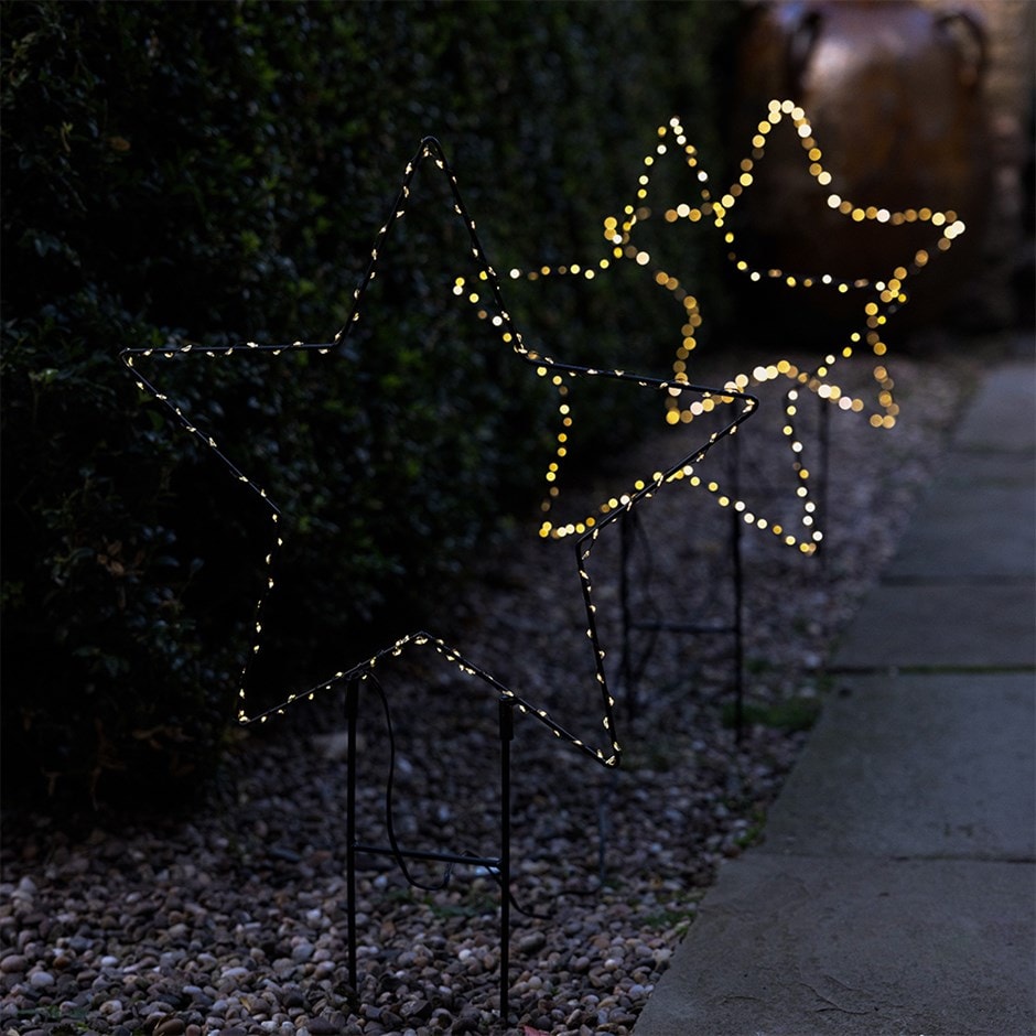 Three outdoor star path lights