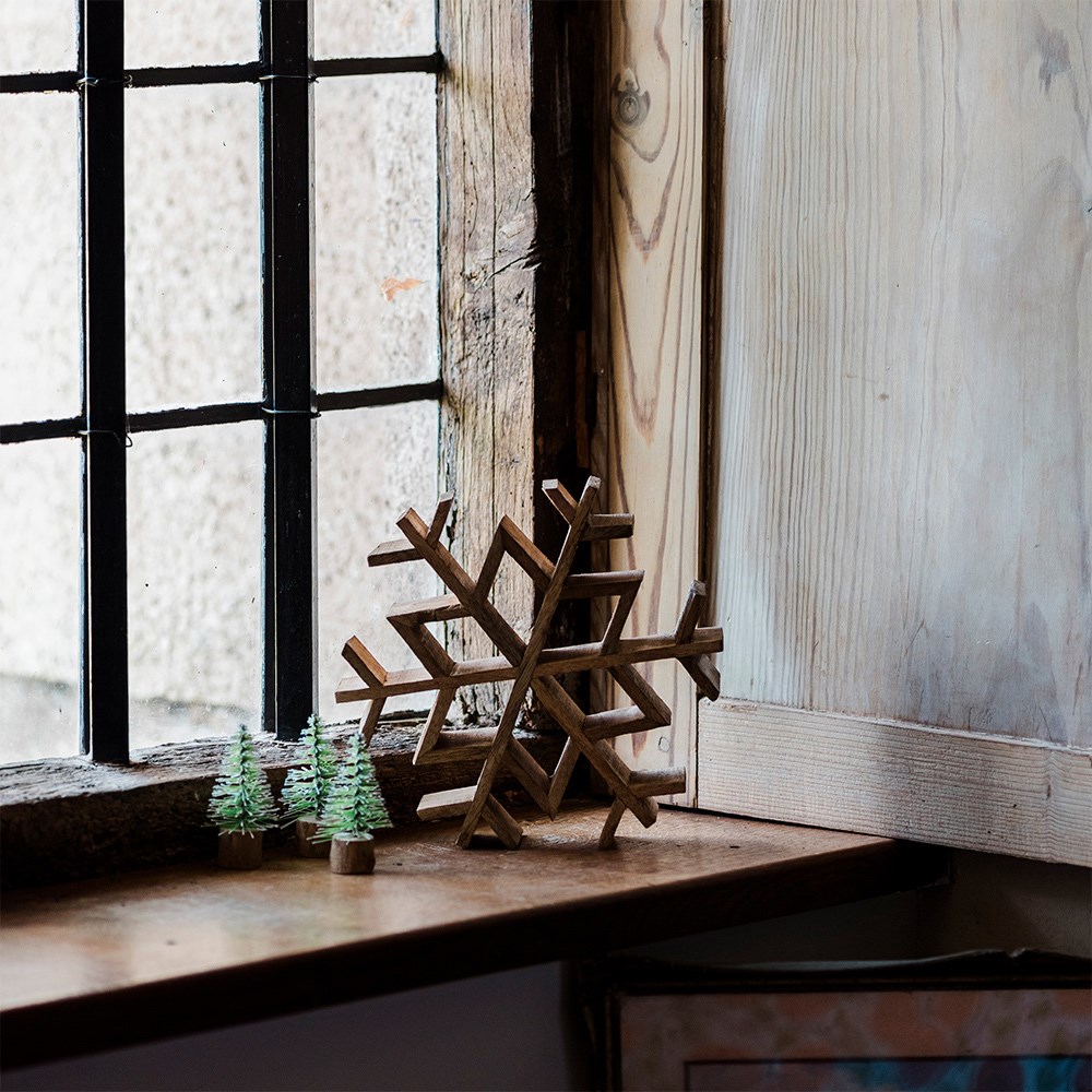 Standing wooden snowflake
