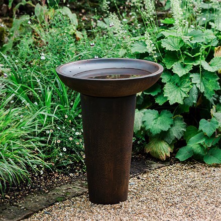 Rustic standing fibreclay bird bath - dark rust