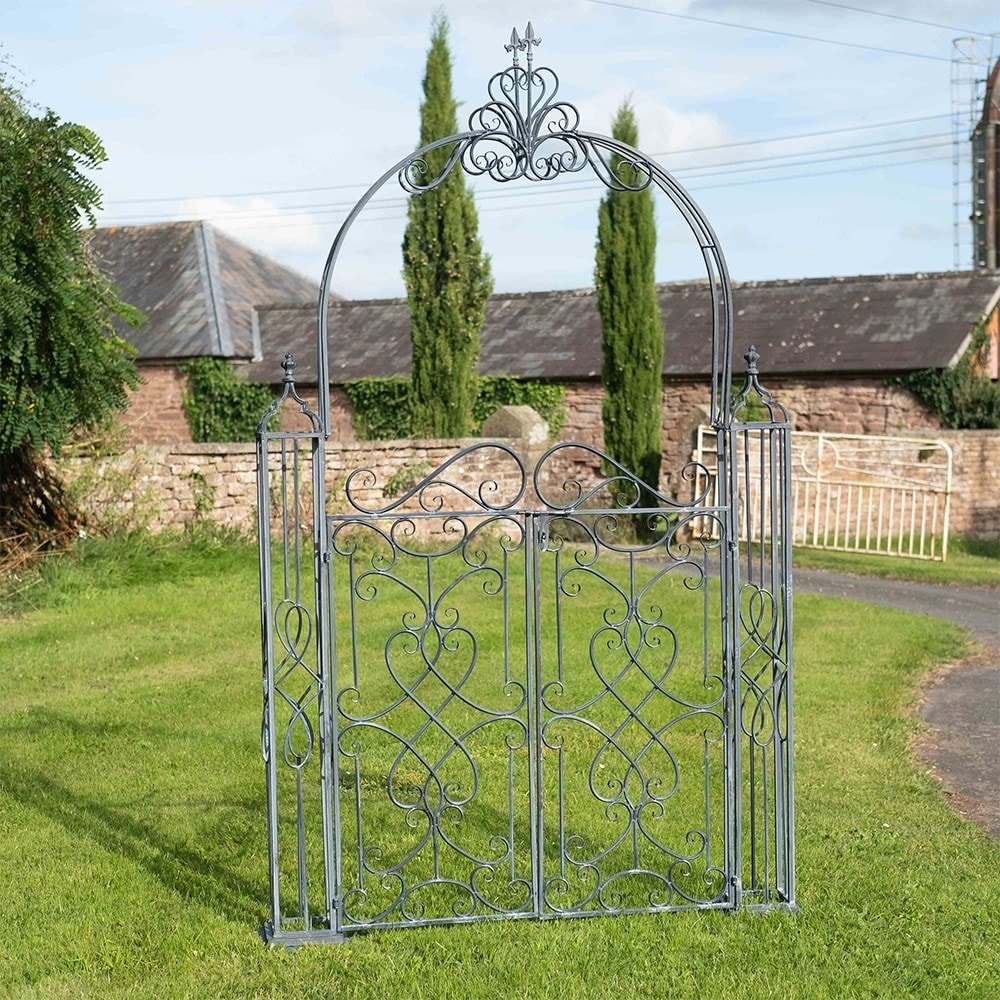 Ornate arch with gates - antique grey