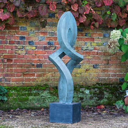 Abstract verdigris garden statue