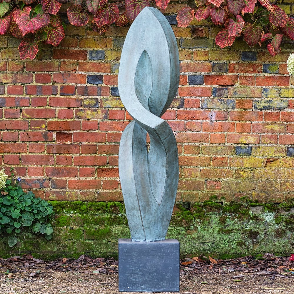 Abstract verdigris garden statue