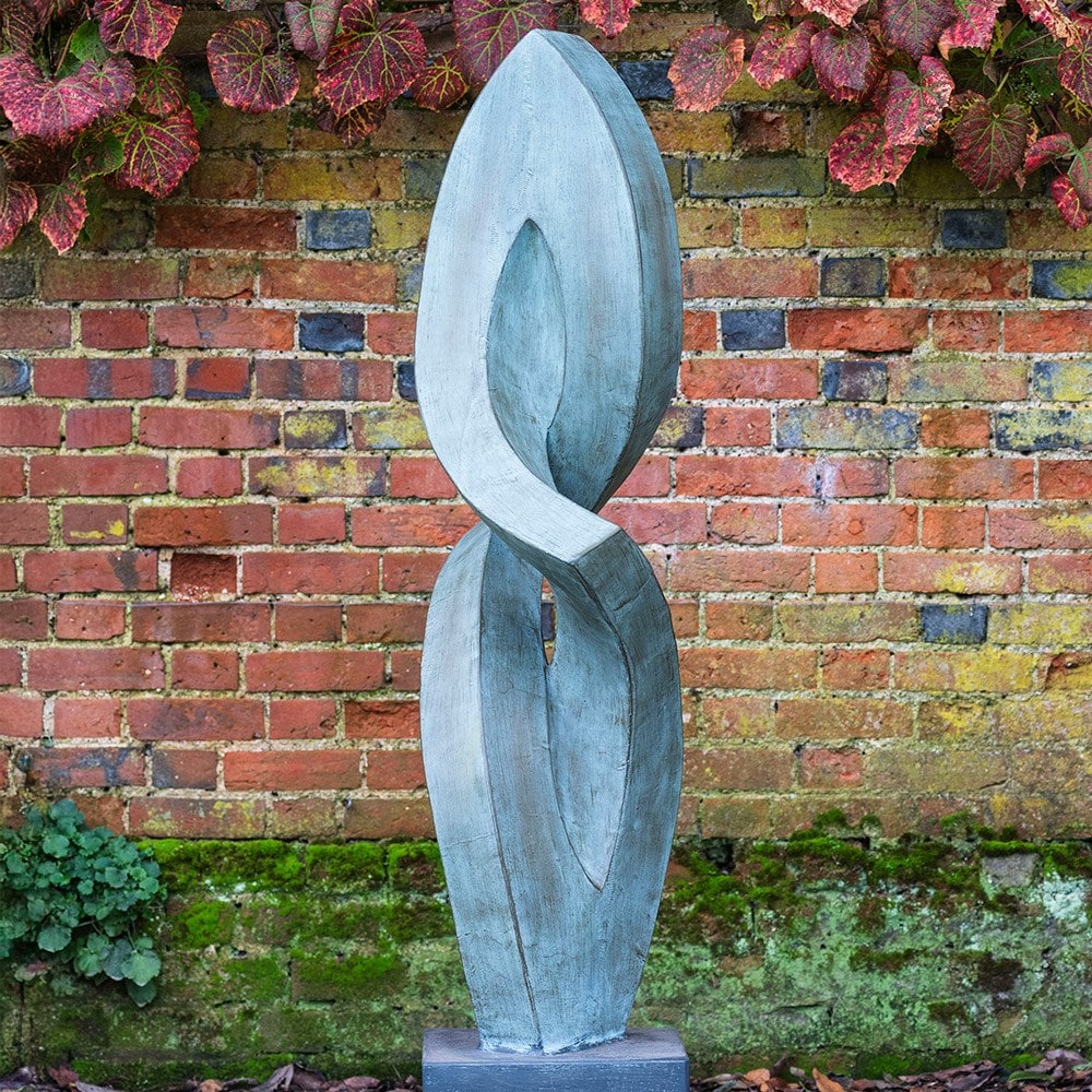 Abstract verdigris garden statue