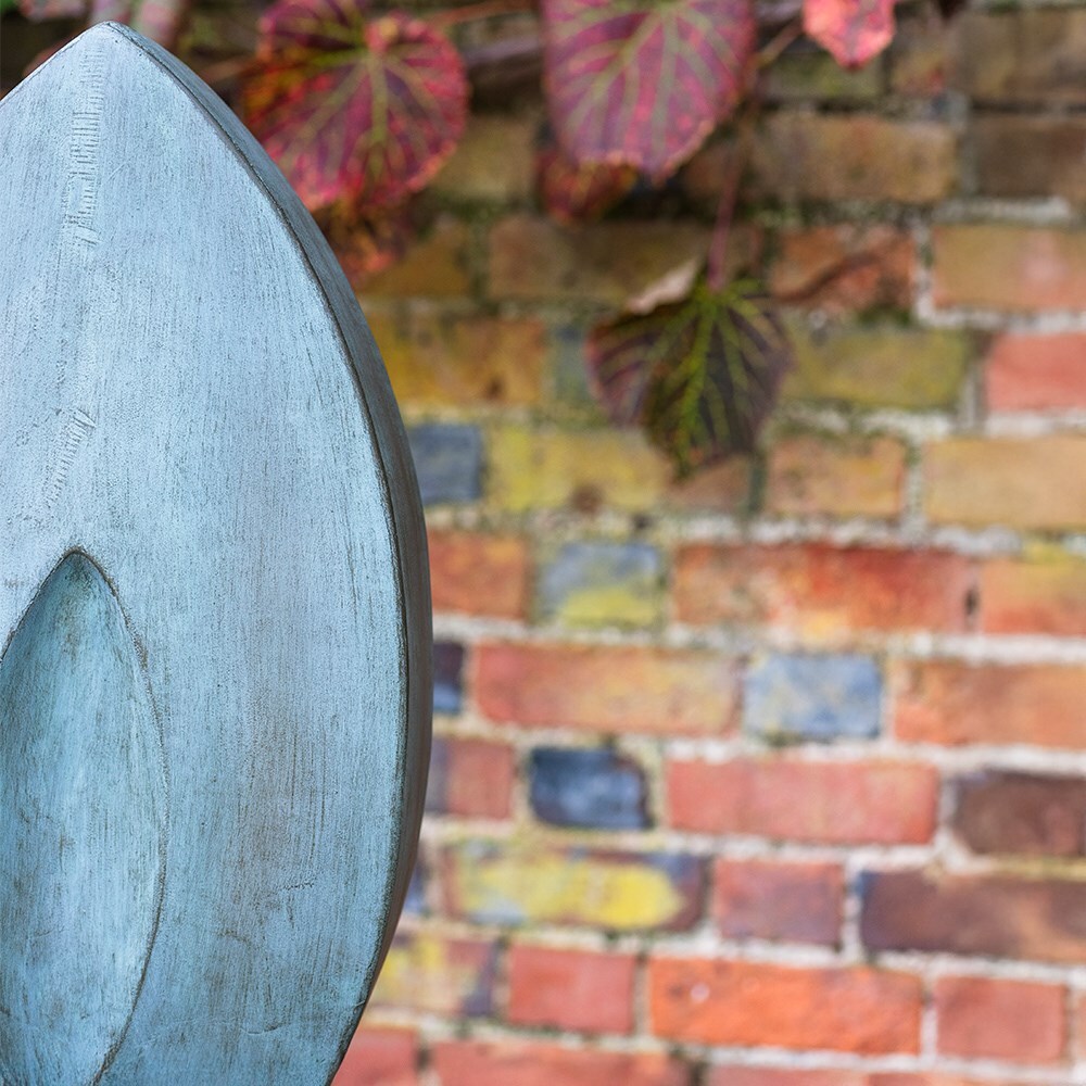 Abstract verdigris garden statue