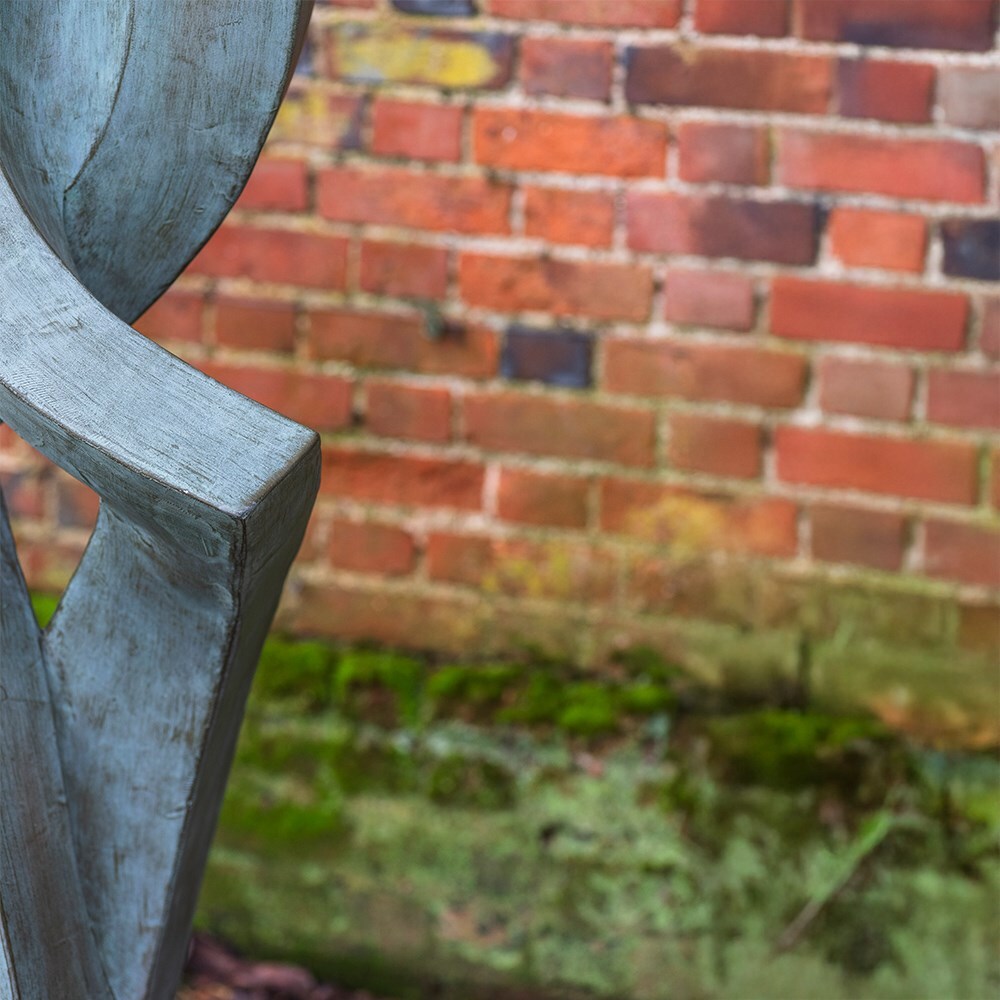 Abstract verdigris garden statue