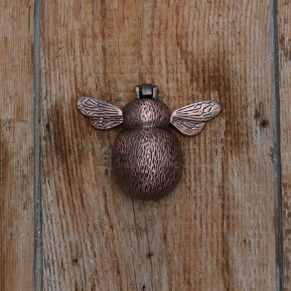 Aged bronze bee door knocker