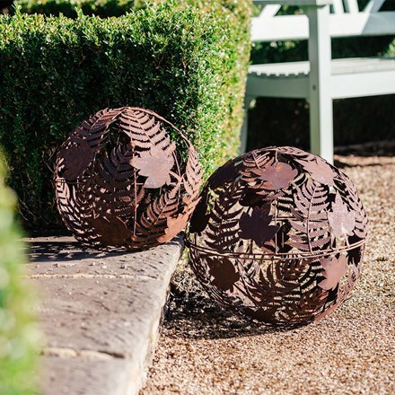 Set of two rusted leaf spheres