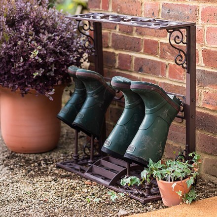 Cast iron ornate boot rack