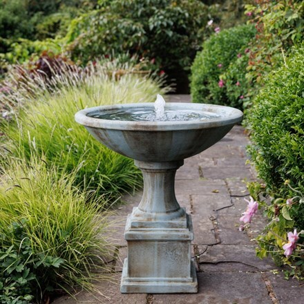 Traditional bowl plinth water fountain