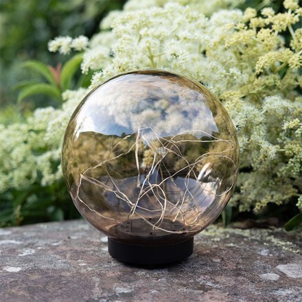 Solar stake ball with twinkle lights