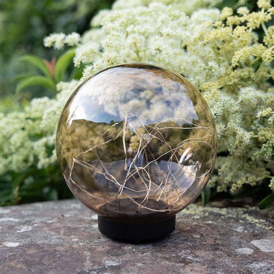 Solar stake ball with twinkle lights