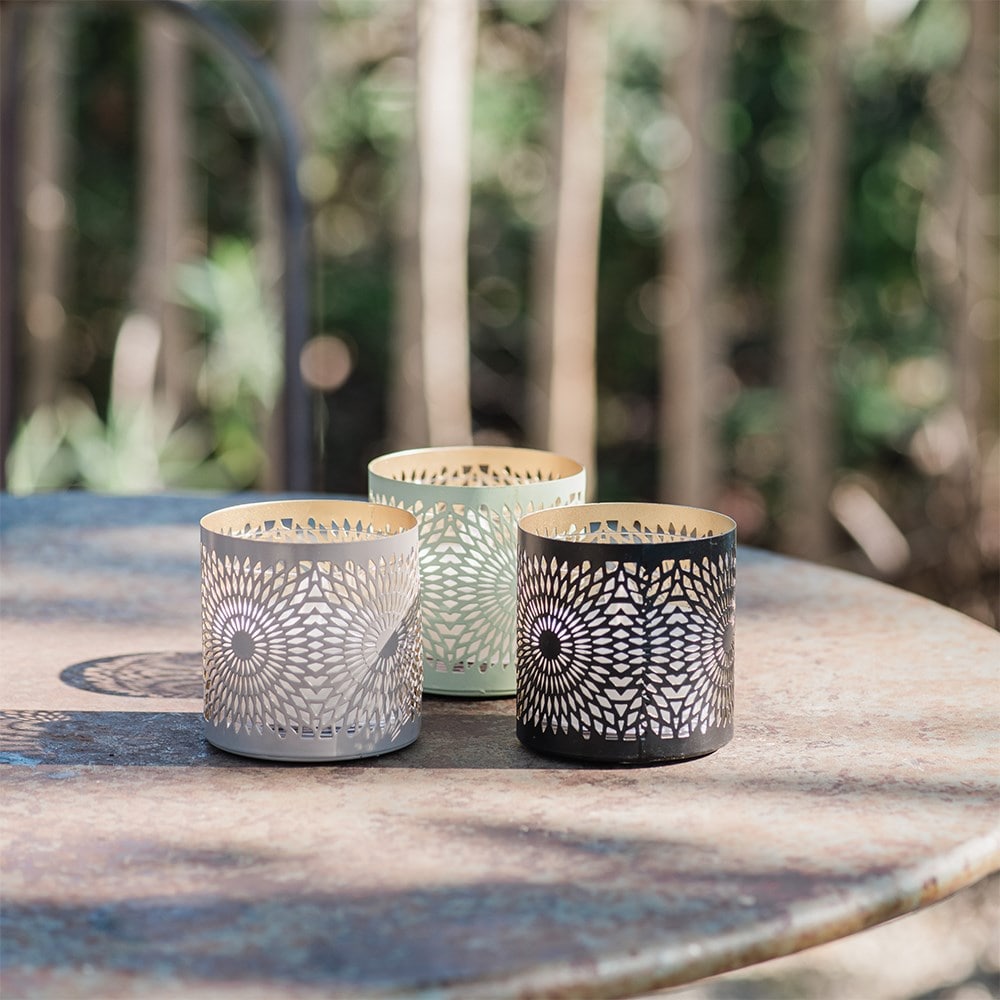 Three solar cut out tea lights