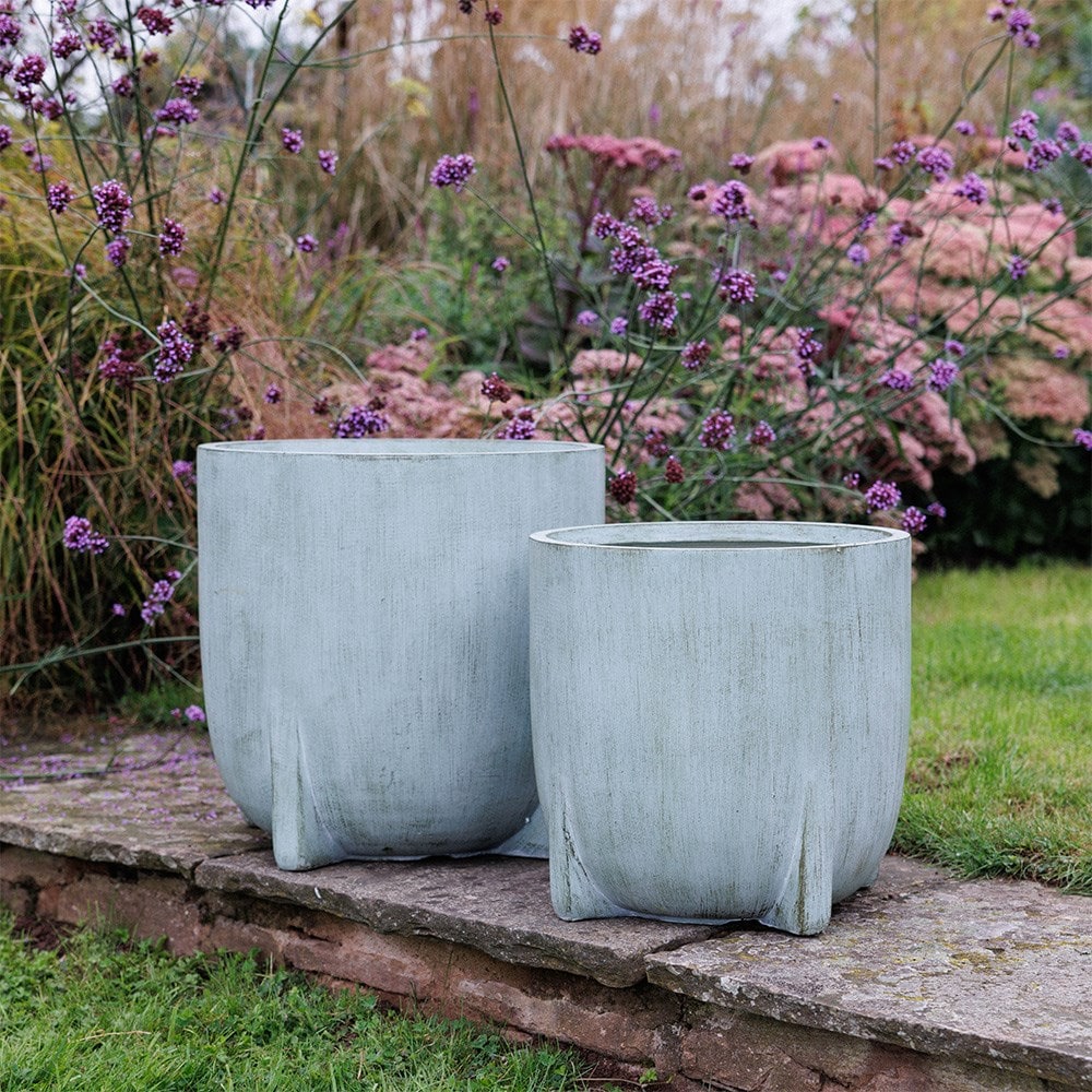 Set of two footed planters - weathered verdigris