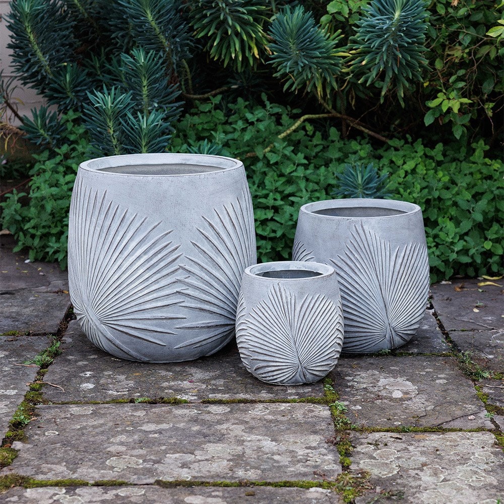 Set of three grey planters with leaf design