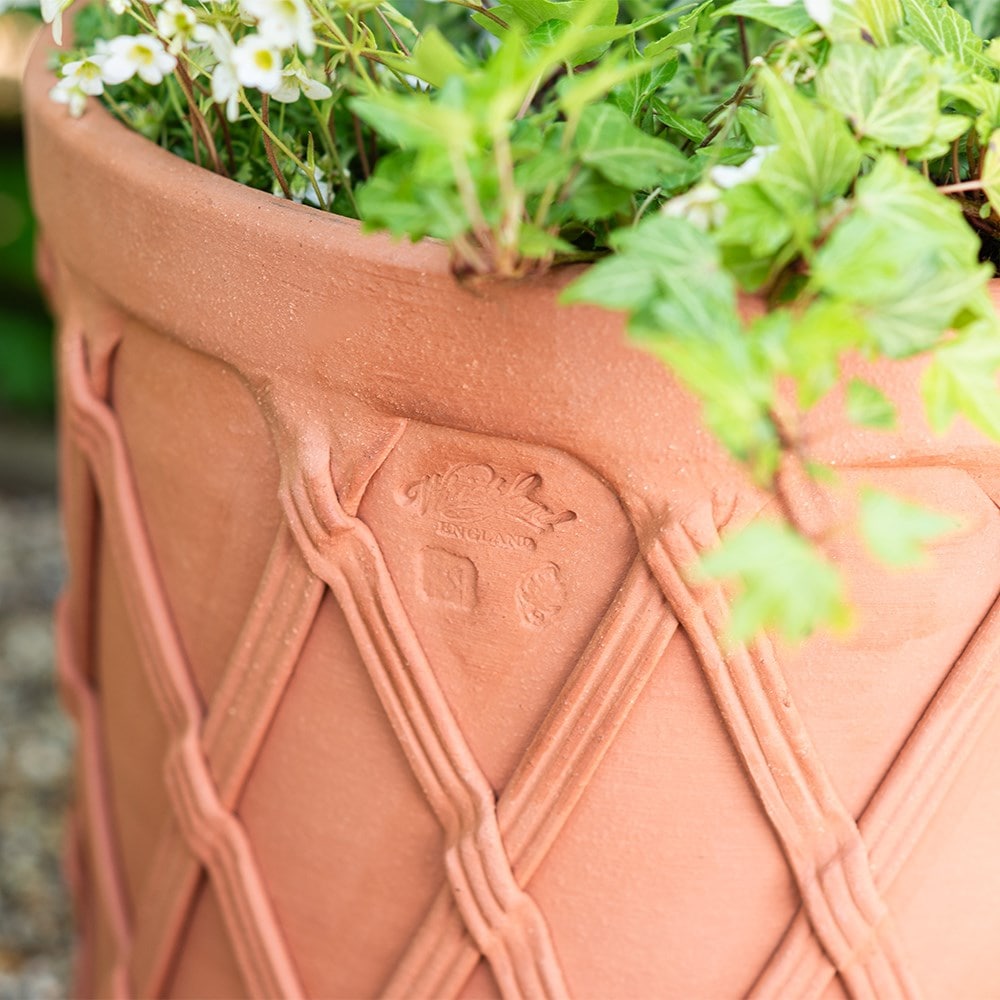 Terracotta basket barrel pot
