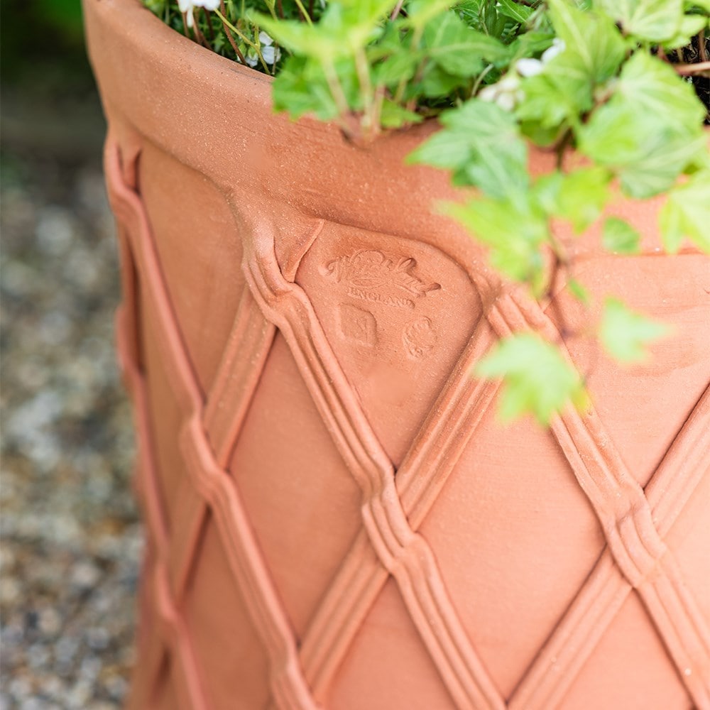 Terracotta basket barrel pot