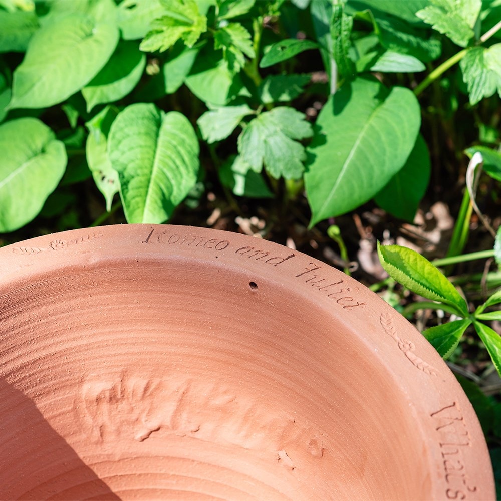 Terracotta romeo & juliet pot