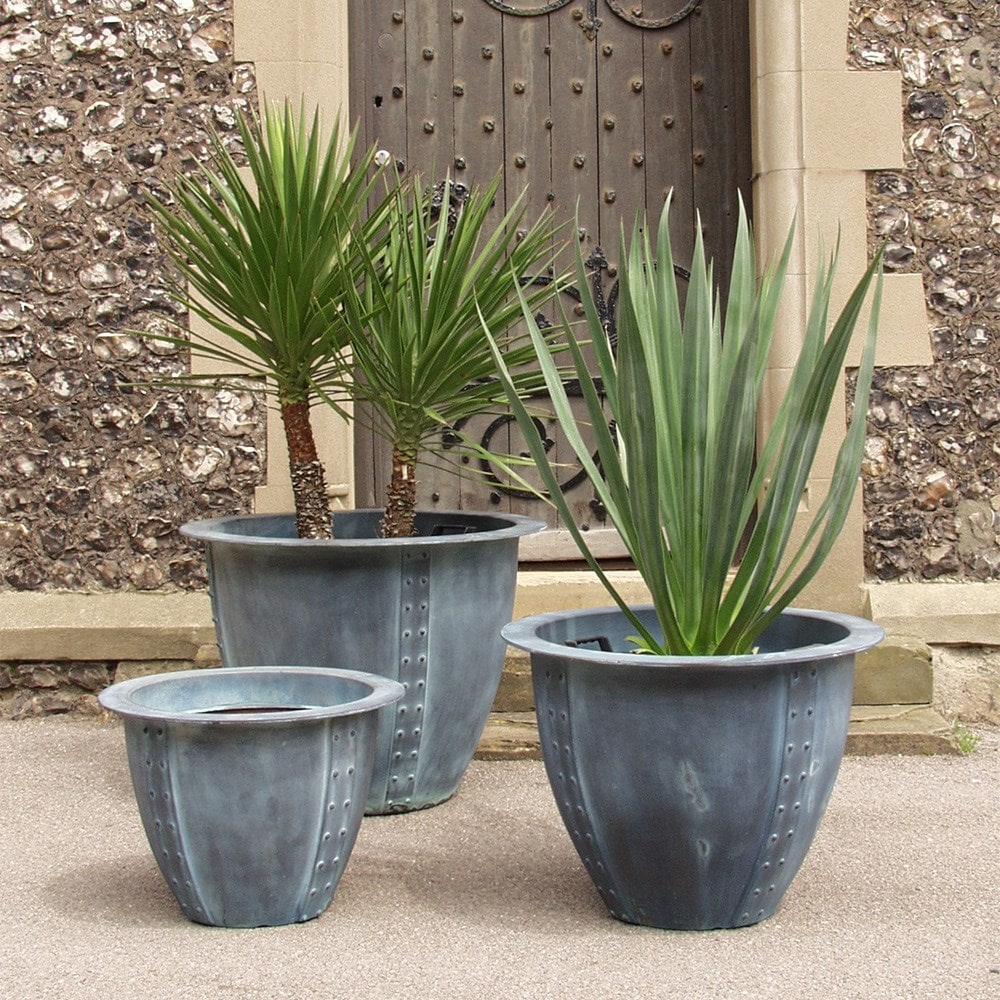 Lightweight riveted beaten copper effect planter