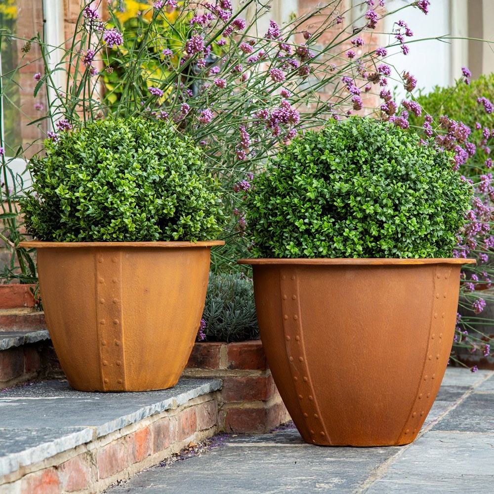 Lightweight riveted rust finish planter