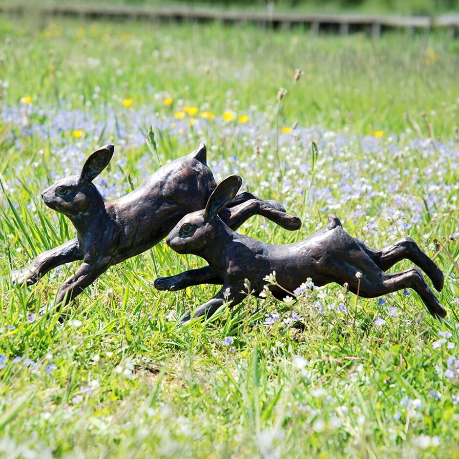 Pair of running rabbits - aged verde