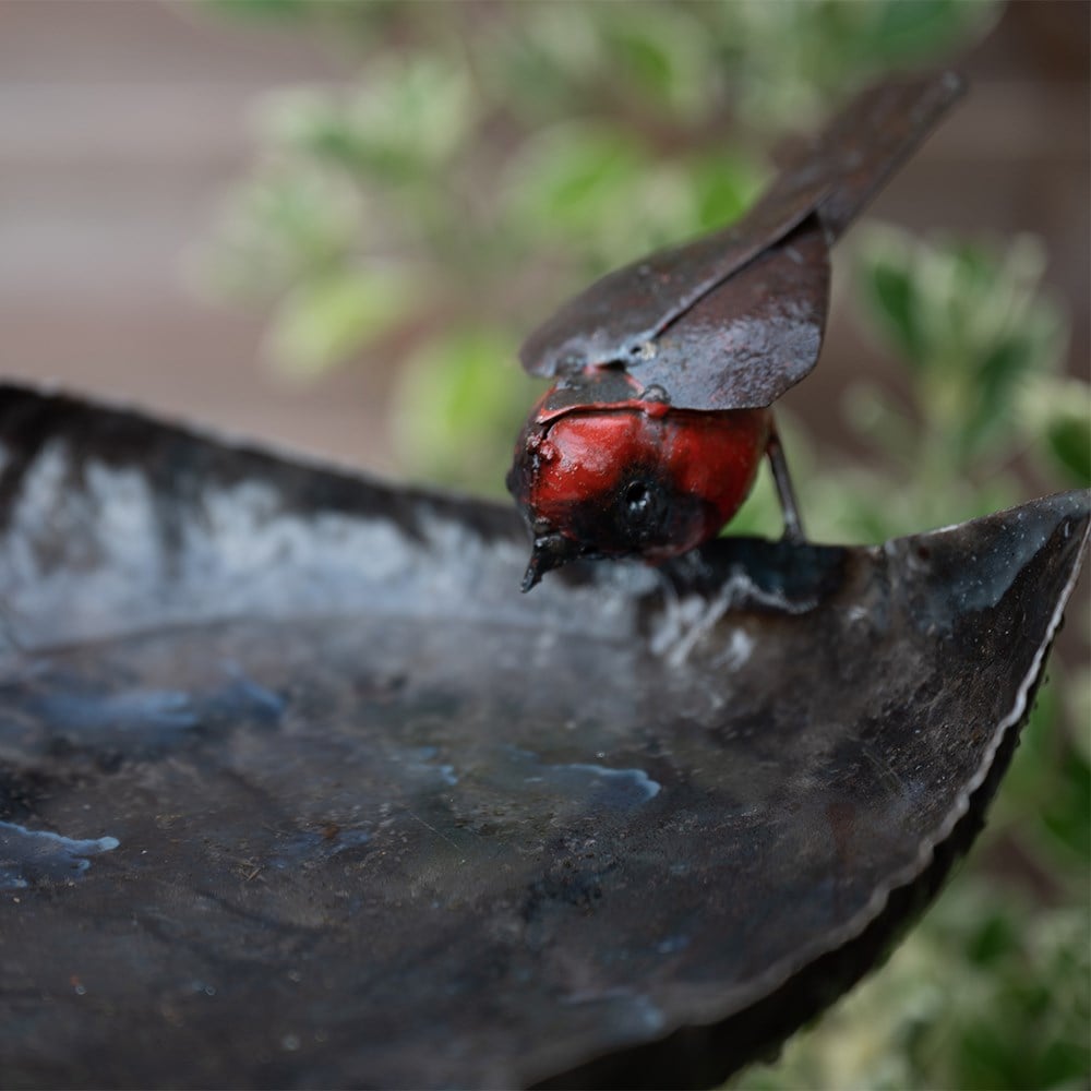 Leaf bird feeder on stake