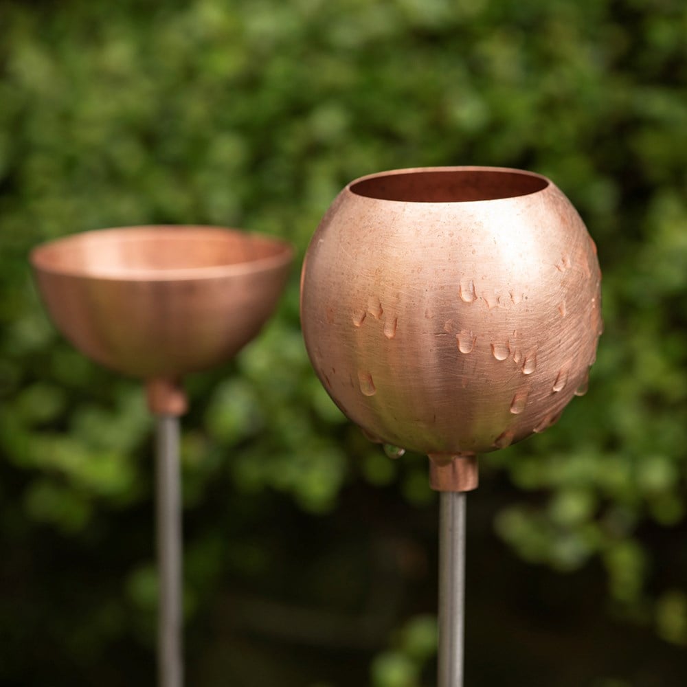 Copper bowl on stainless steel stake
