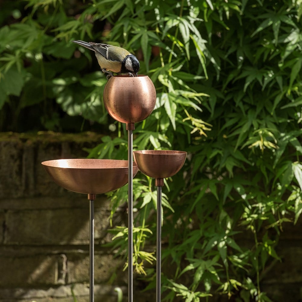 Copper bowl on stainless steel stake