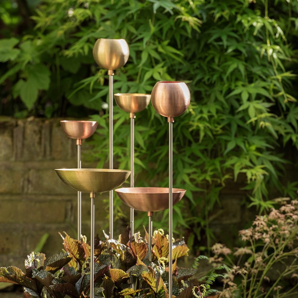 Copper bowl on stainless steel stake