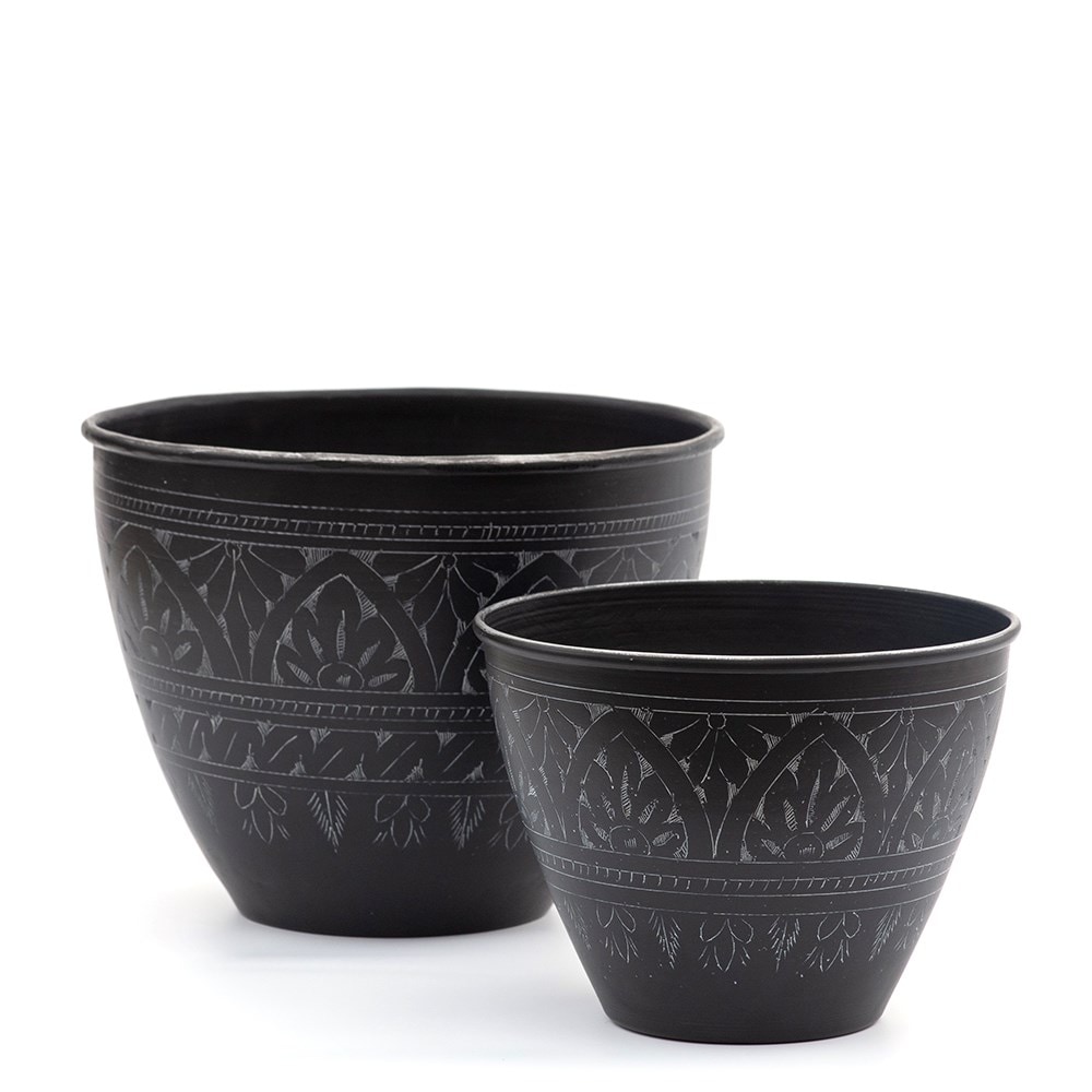 Traditionally etched black pot 
